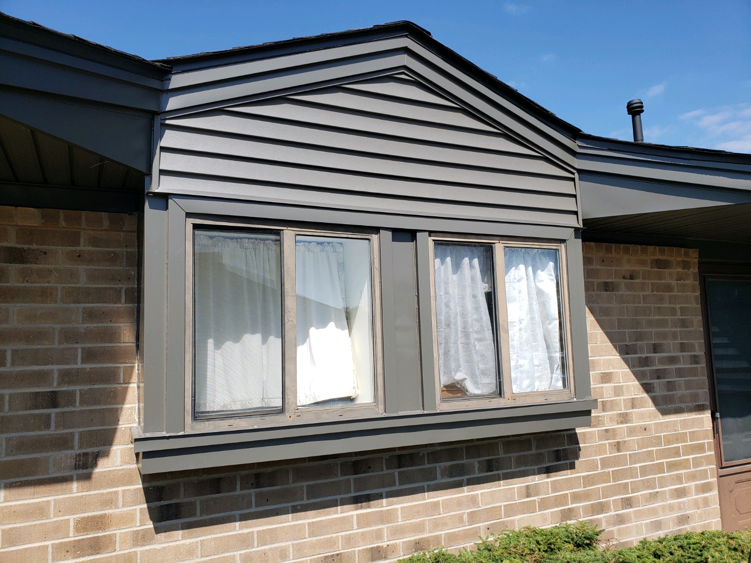 Roofing, siding, trim, and gutter updates